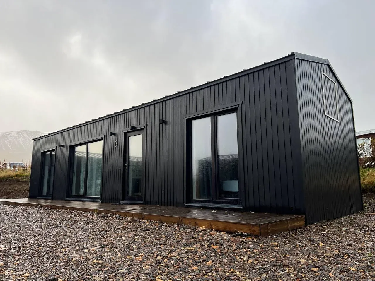 A built Bouw Art modular house with black cladding